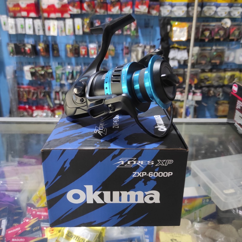 Reel Pancing Okuma Zores ZXP-6000P Original – 6+1 Bearing, Drag 13kg, Reel Air Asin SW