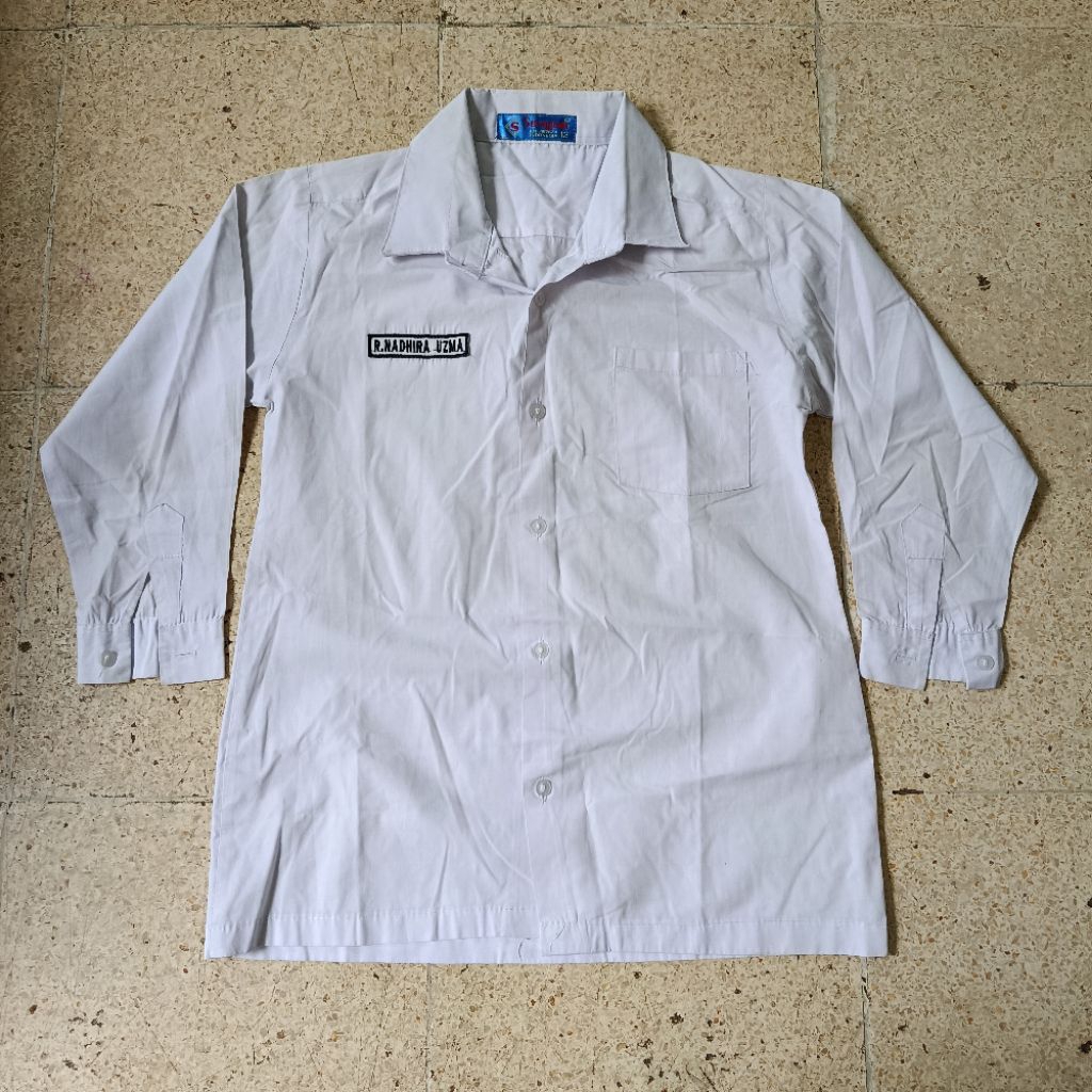 PL baju sekolah putih merk seragam / tan 152