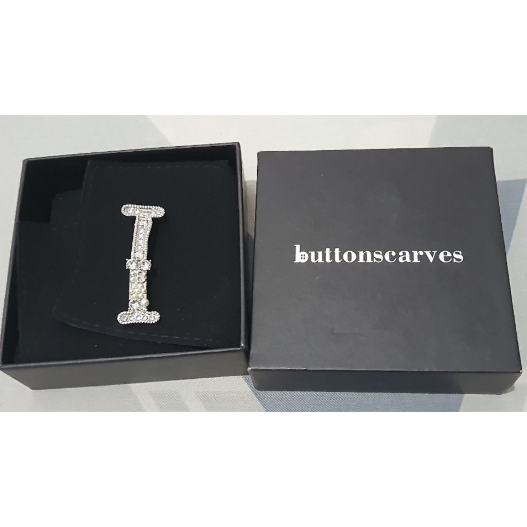 Buttonscarves The Alphabet Brooch in Silver