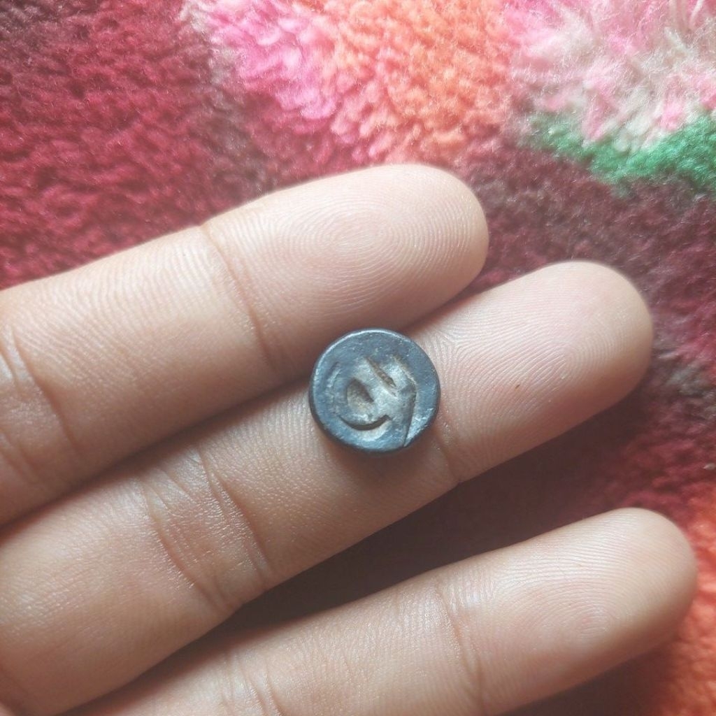 Koin perak sriwijaya asli.