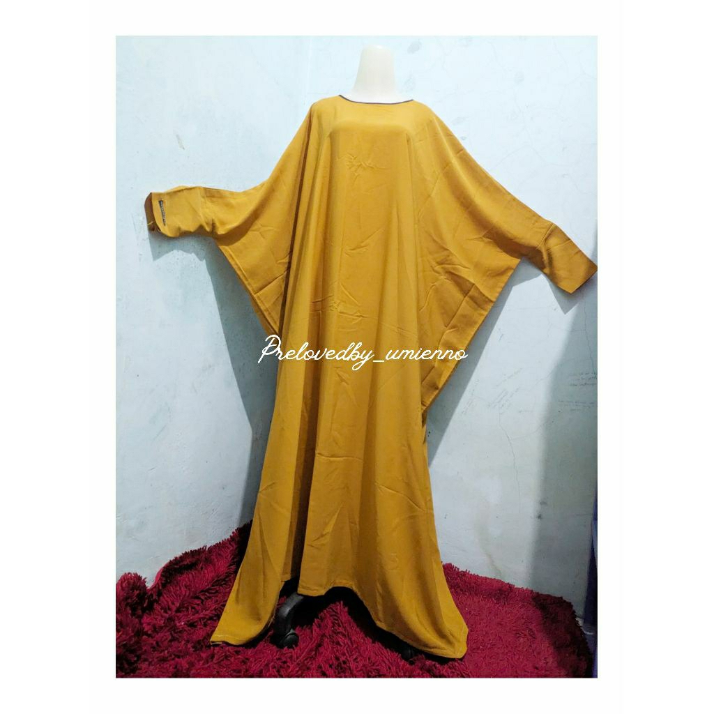 Abaya Purnamasaridevi Kuning