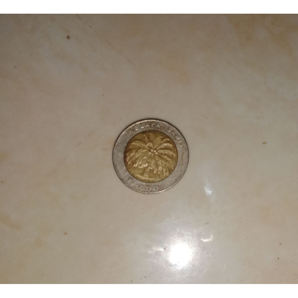 uang koin kelapa sawit tahun 1996