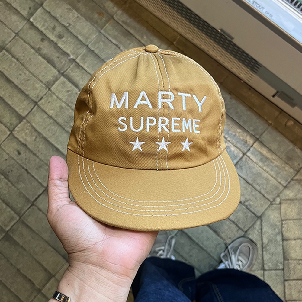 Topi Bootleg MartySupreme Warna Camel Simpel Motif Detail Bordir