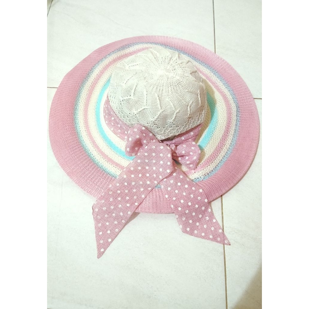 preloved topi pantai