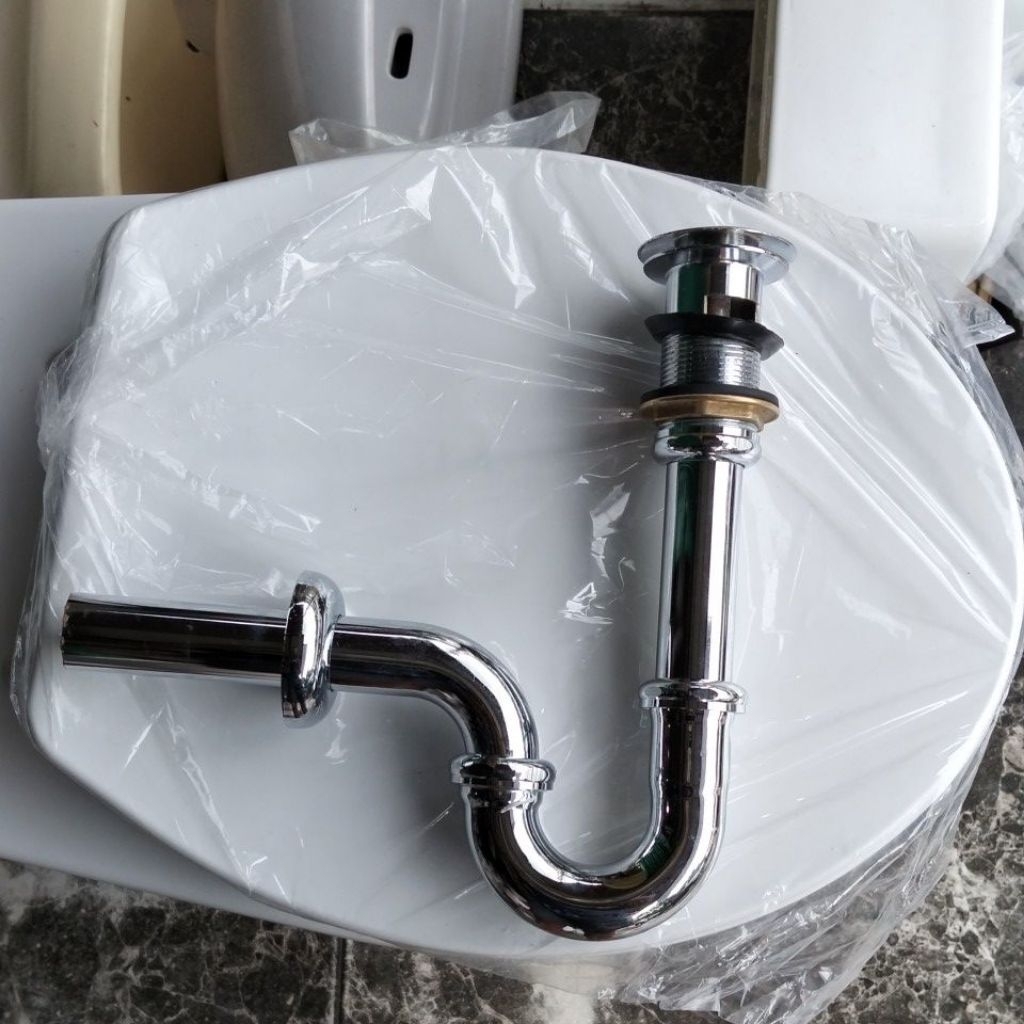 sifon wastafel Toto model pencet