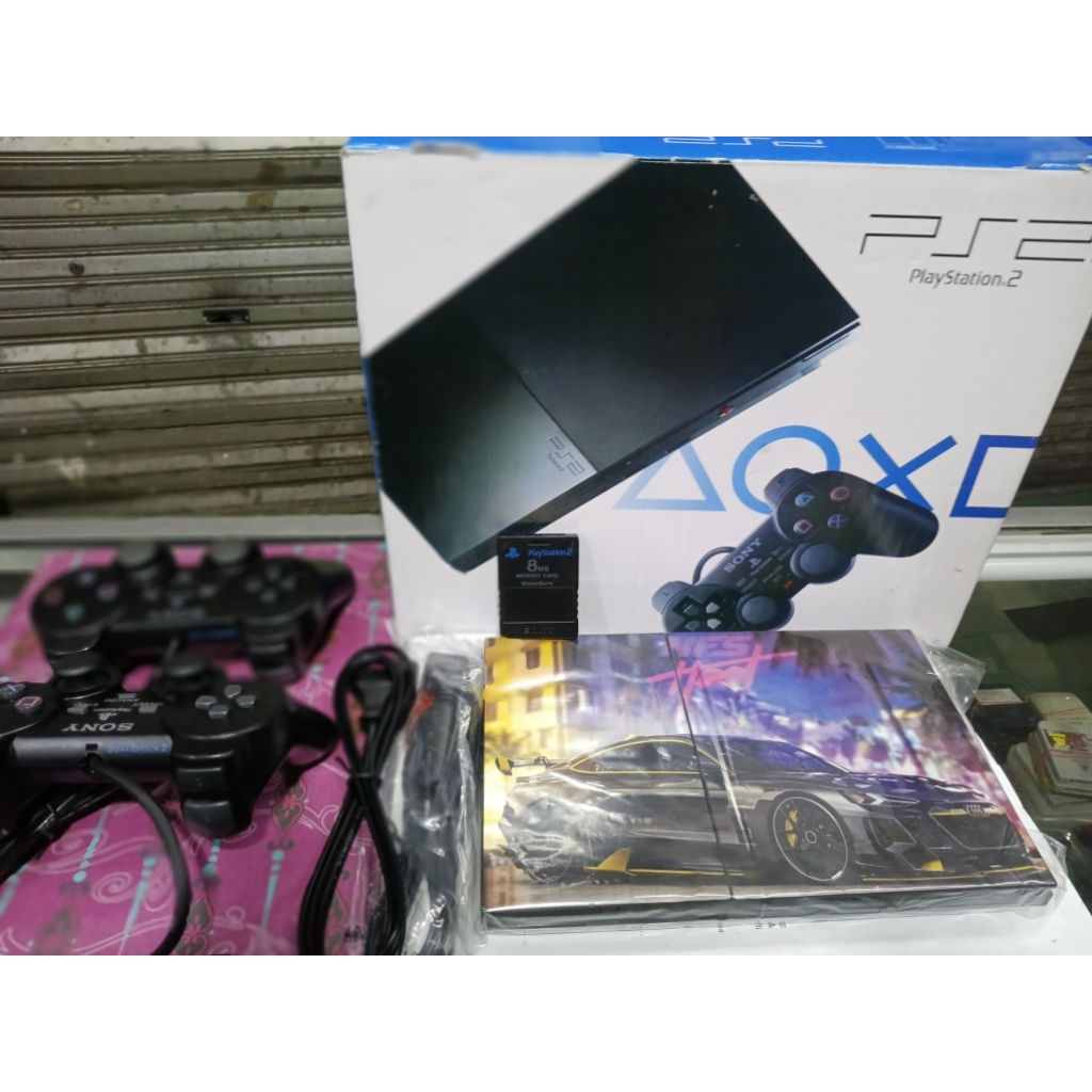 ps2 slim Sony seri9  bisa kebaca kaset paket komplit.seperti di foto