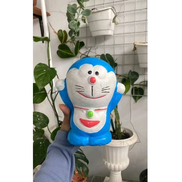celengan doraemon tanah liat lucu