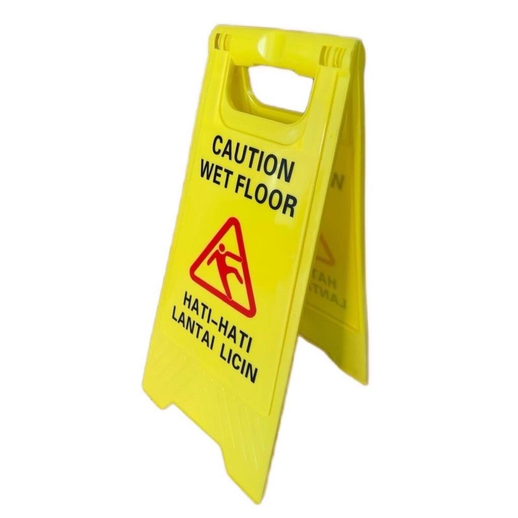 Papan peringatan lantai licin / caution wet floor