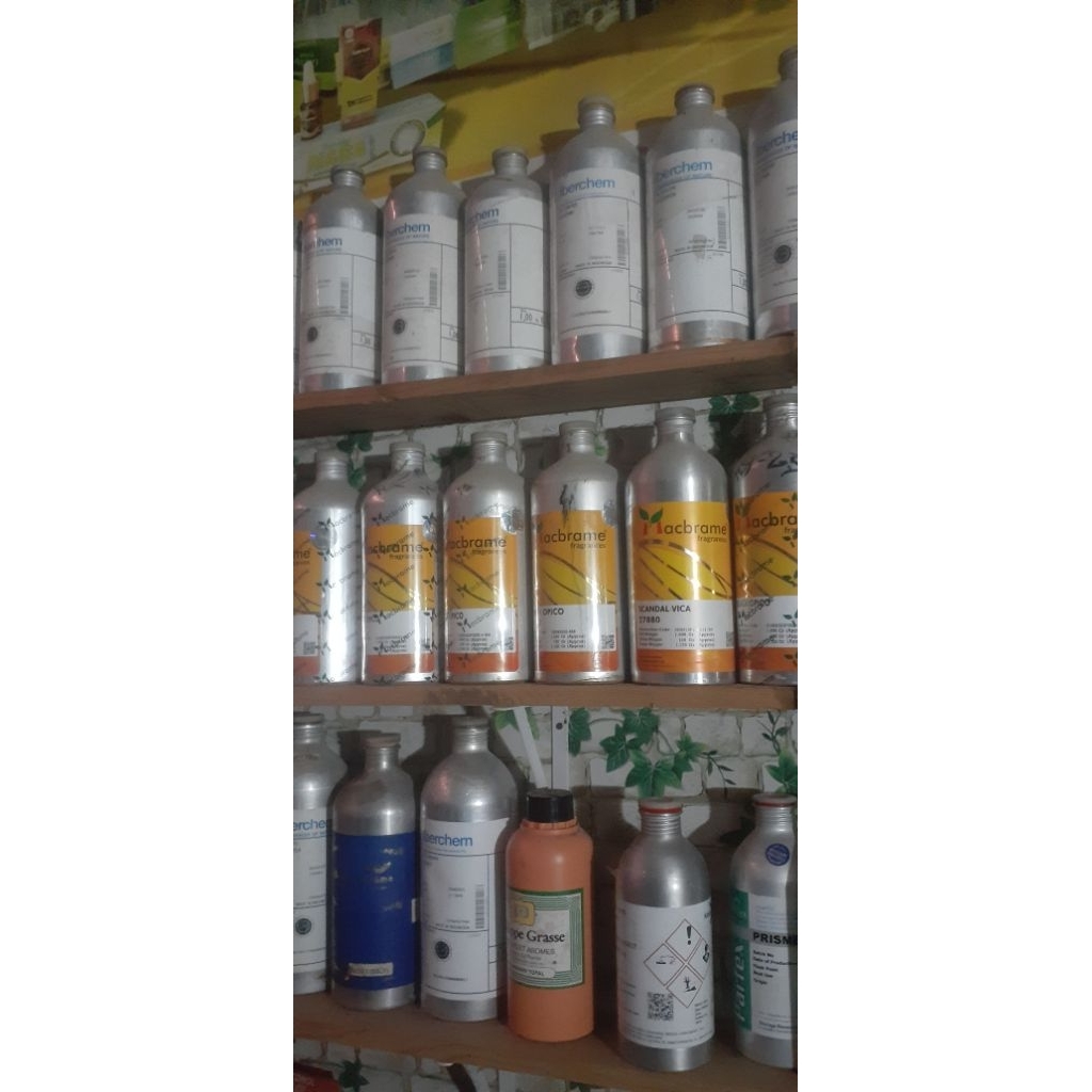 paket biang parfum aromania kaleng segel.