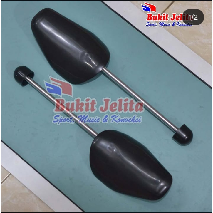 Penyangga sepatu/ saddle sepatu