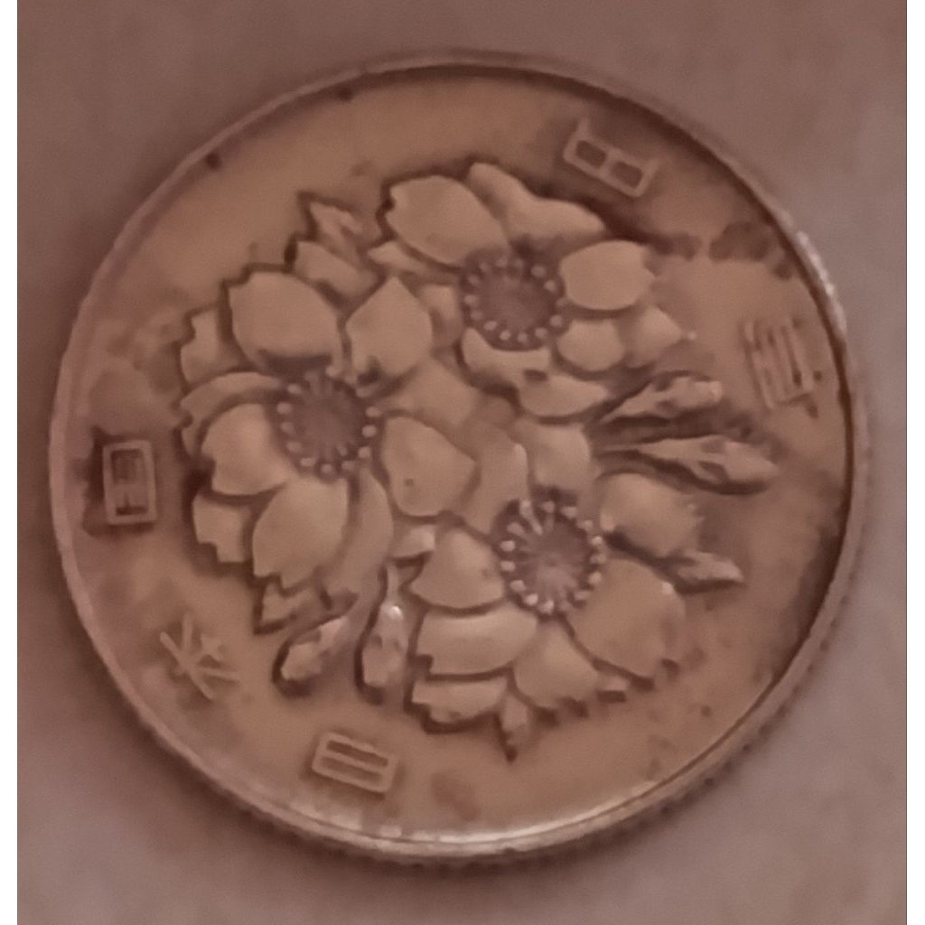 koin Jepang 100 yen tahun 1992..