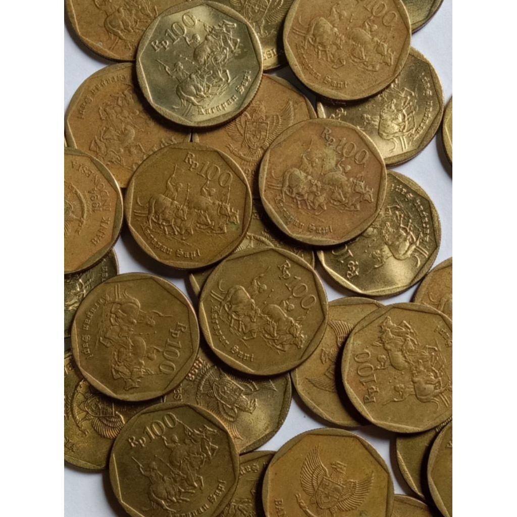 Uang koin kuno 100 rupiah karapan sapi