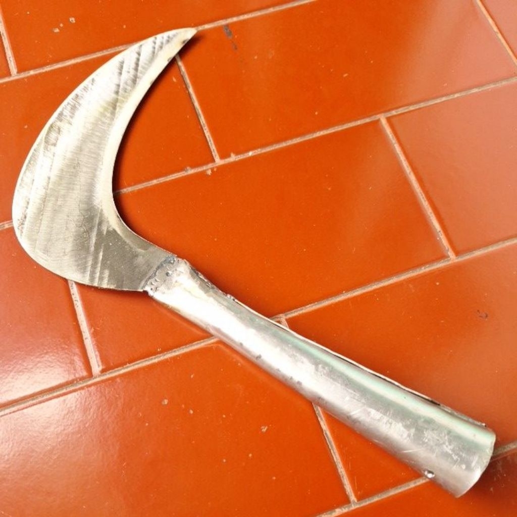 sabit rumput bahan baja