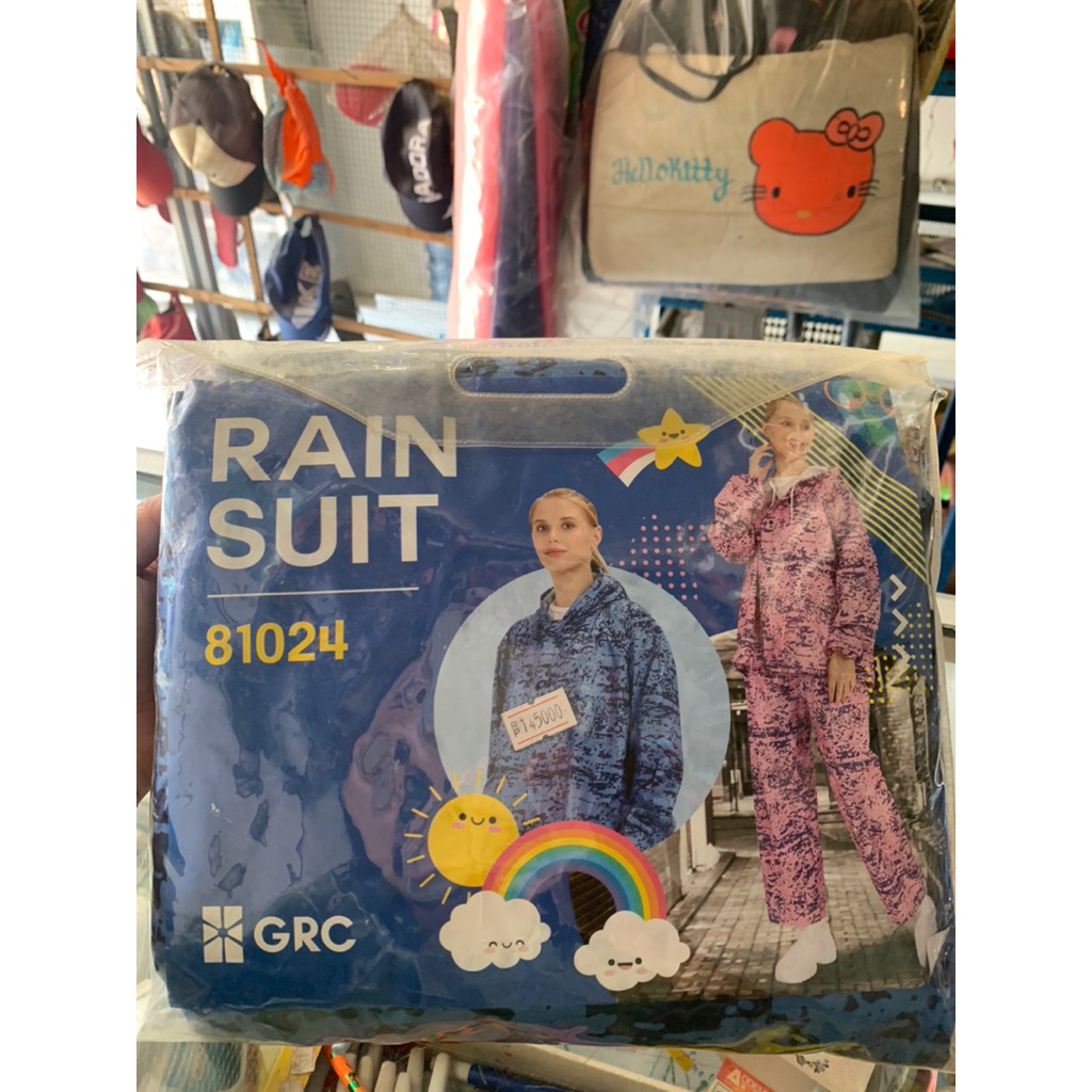 Jas hujan wanita motif