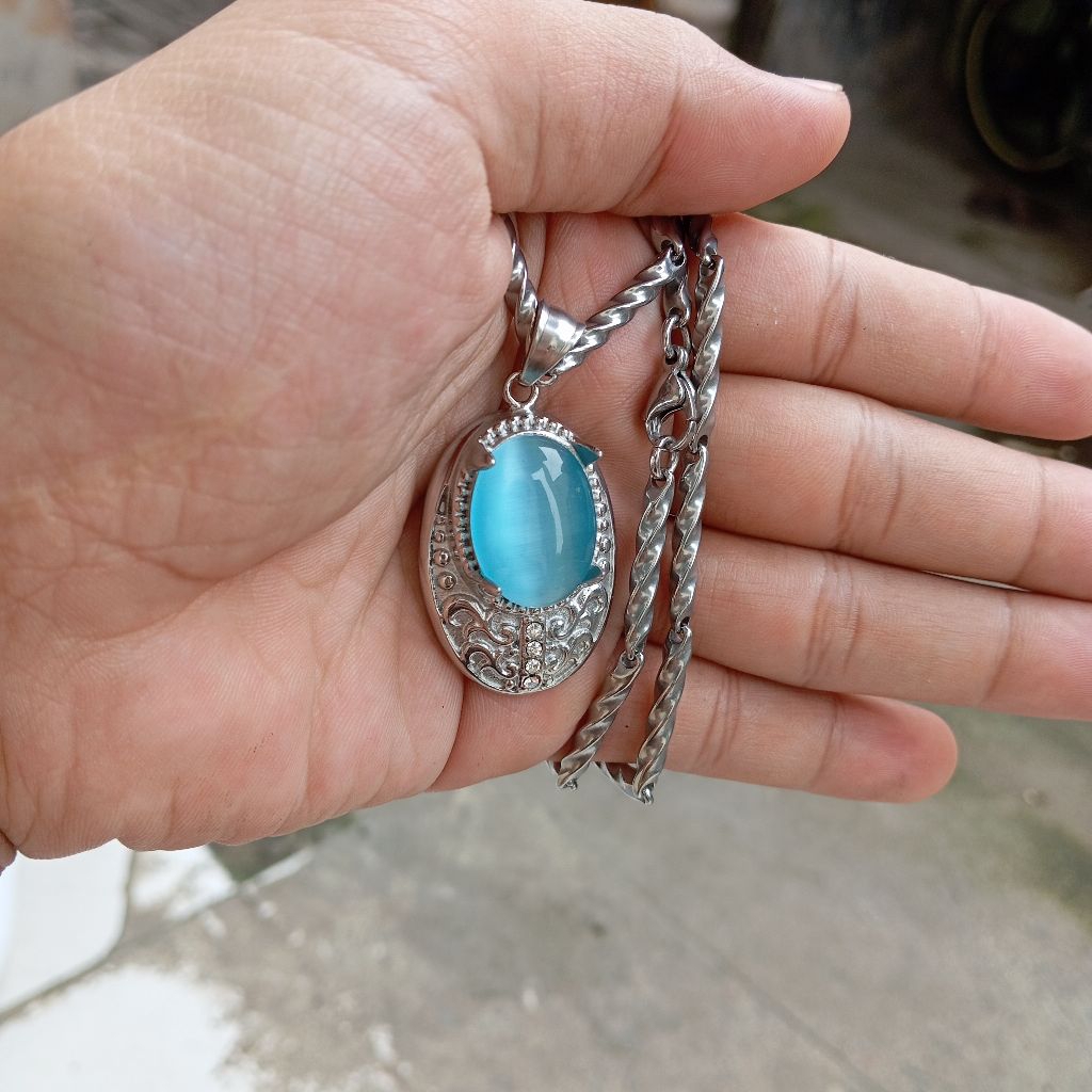 kalung liontin batu akik blue topaz cat eye ring titanium