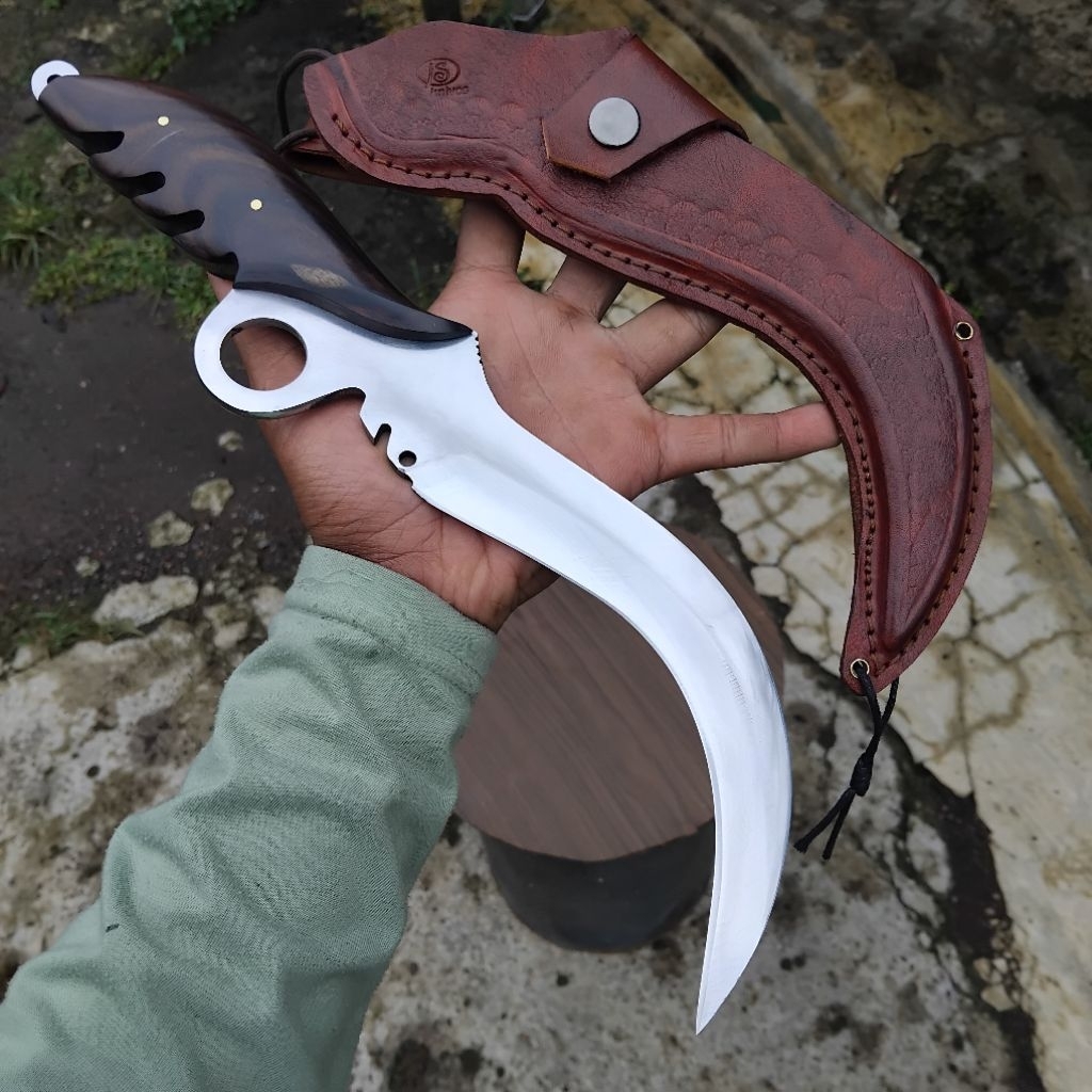 Pisau kudi alat silat merpati putih