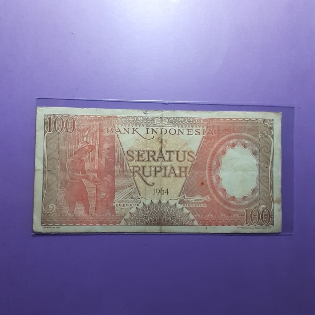 Uang kuno 100 rupiah pekerja 1964