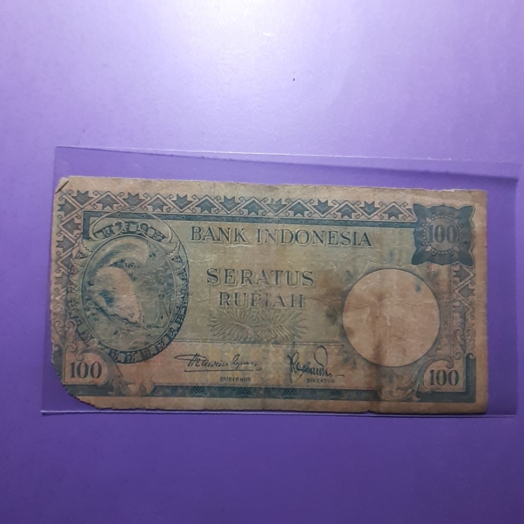 Uang 100 rupiah tupai seri hewan