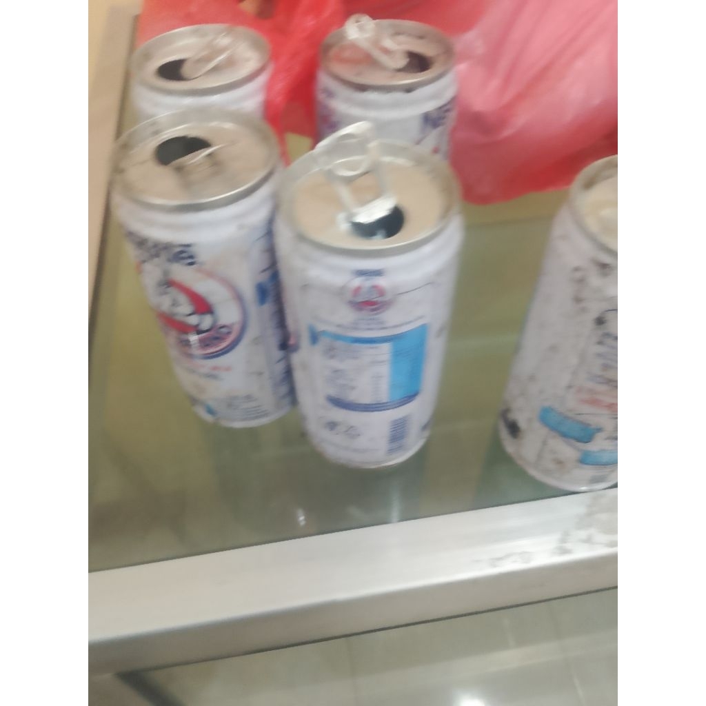 kaleng susu beruang bekas