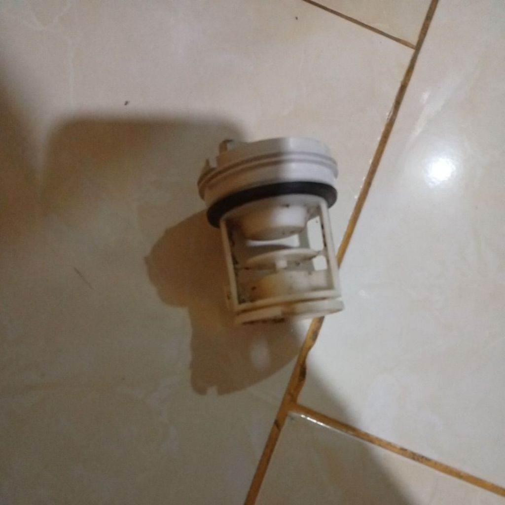 Tutup drain mesin cuci sharp