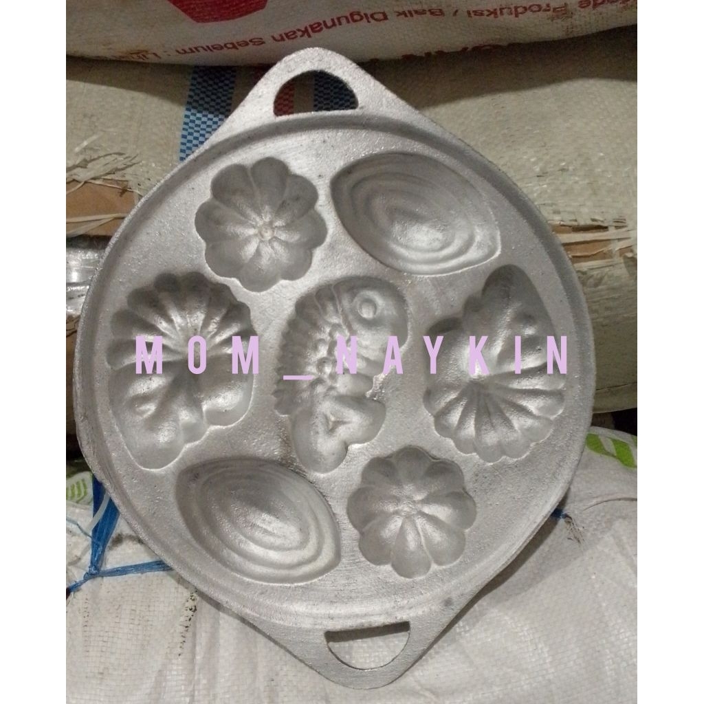 cetakan kue cubit motif 7 lubang/cetakan kie cubit