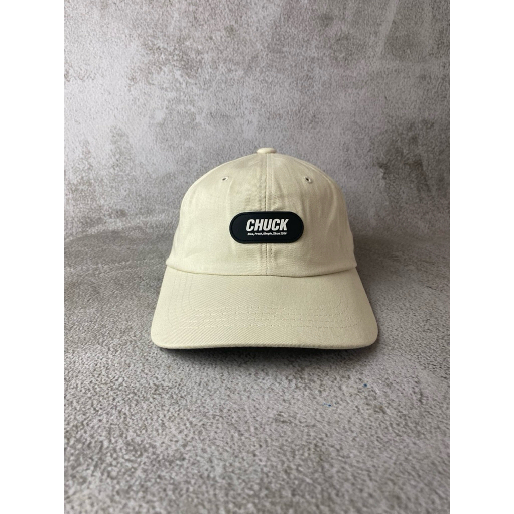 Topi Chuck Rubber logo cream