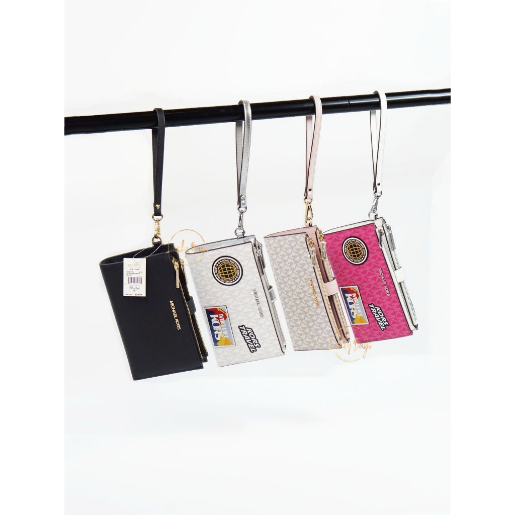 MK jet set travel large double zip wristlet (authentic/original)