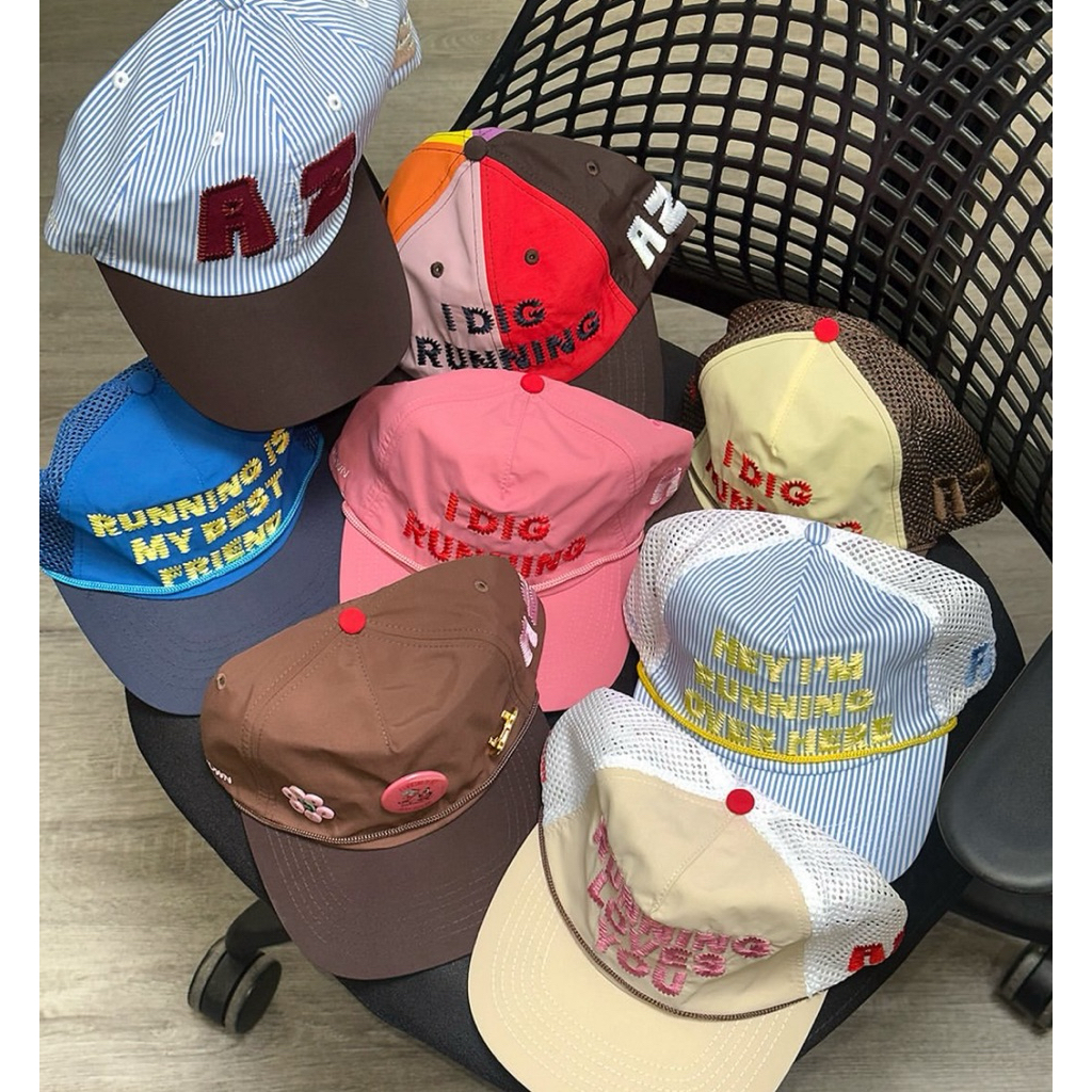 Alex Zono Running Trucker Hat