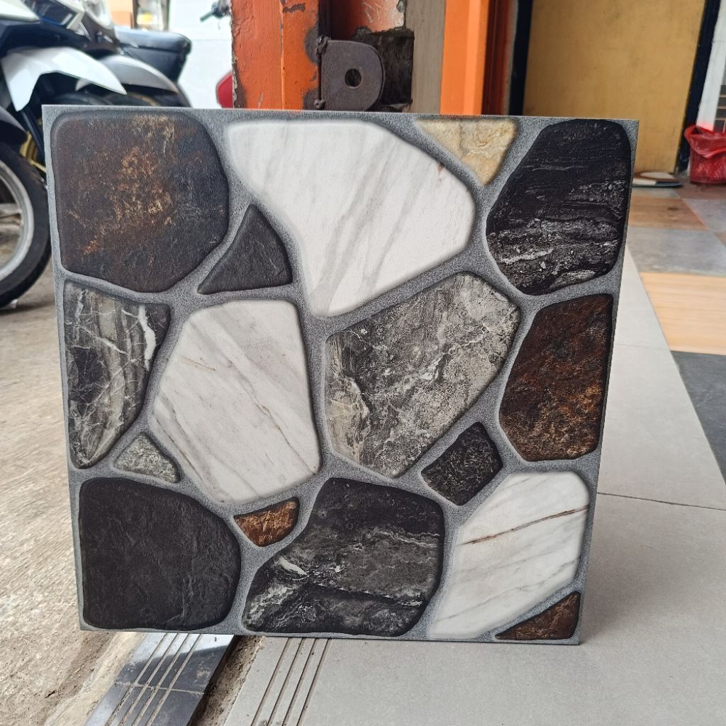 Keramik lantai 50x50 motif batu haystone brown