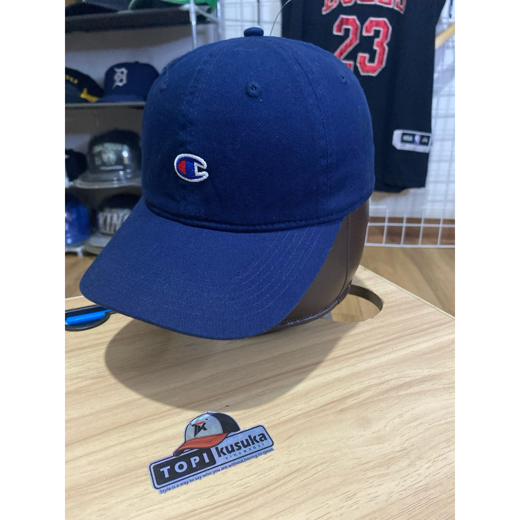 Topi Champions Warna Navy Model Setelan