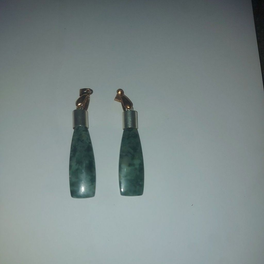 liontin batu badar lumut