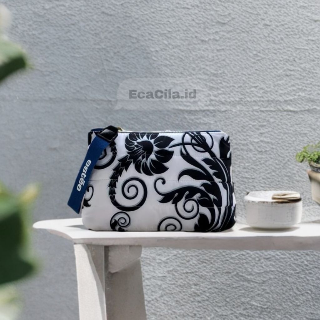 Pouch Estee Lauder puffy bunga