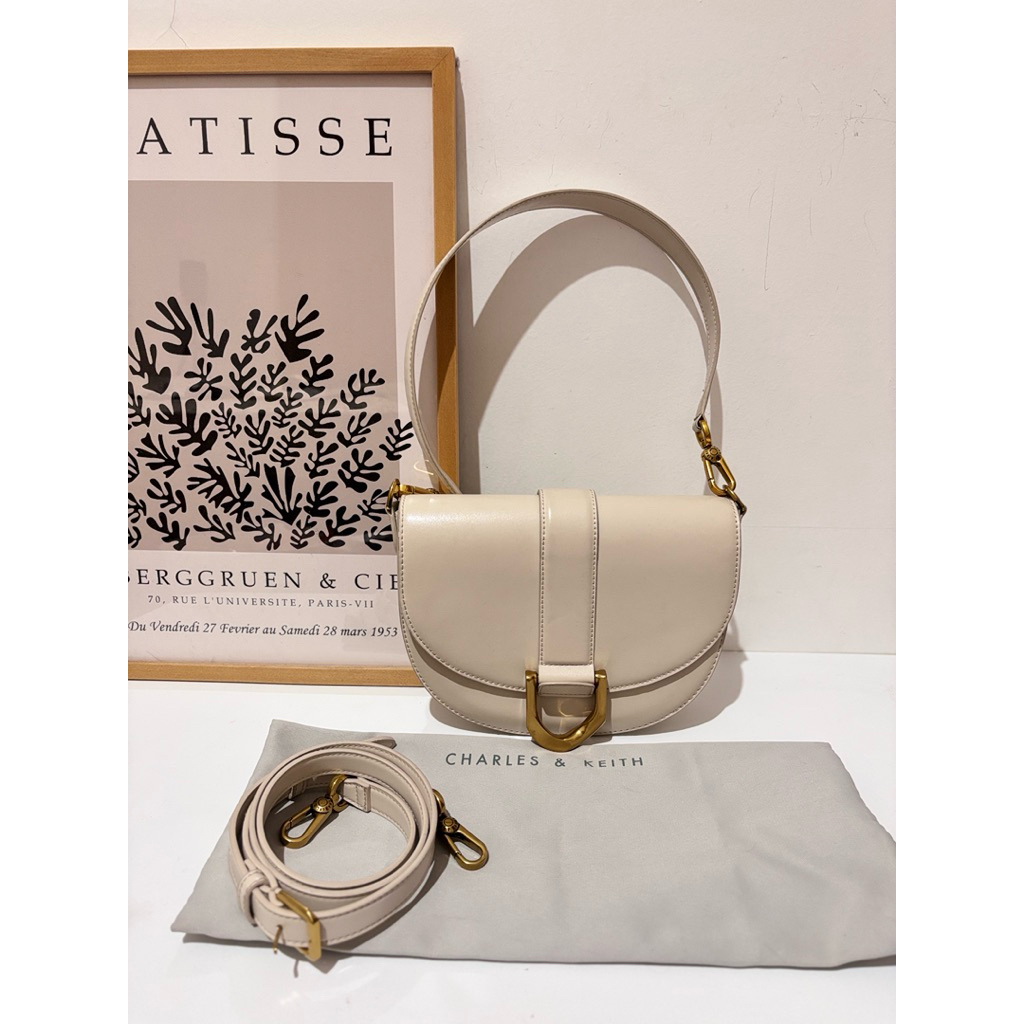 Preloved gabine saddle bag charles & keith original