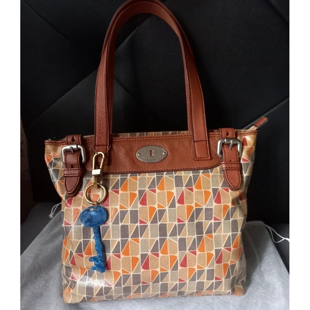 Fossil keyper preloved