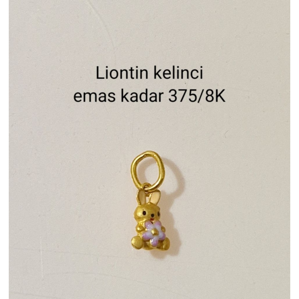 Liontin emas kelinci kadar 375/8K (0.48gram ungu)