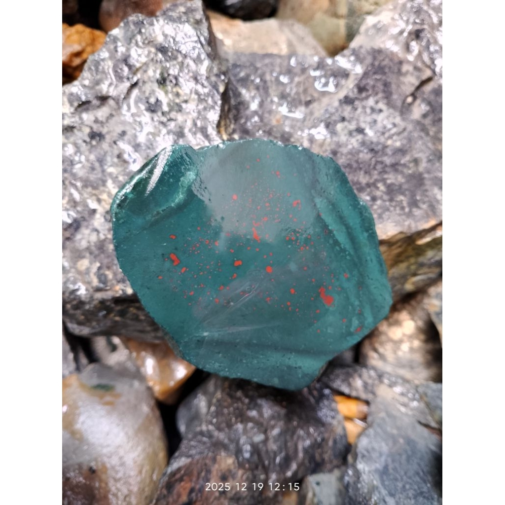 batu nagasui totol lempengan