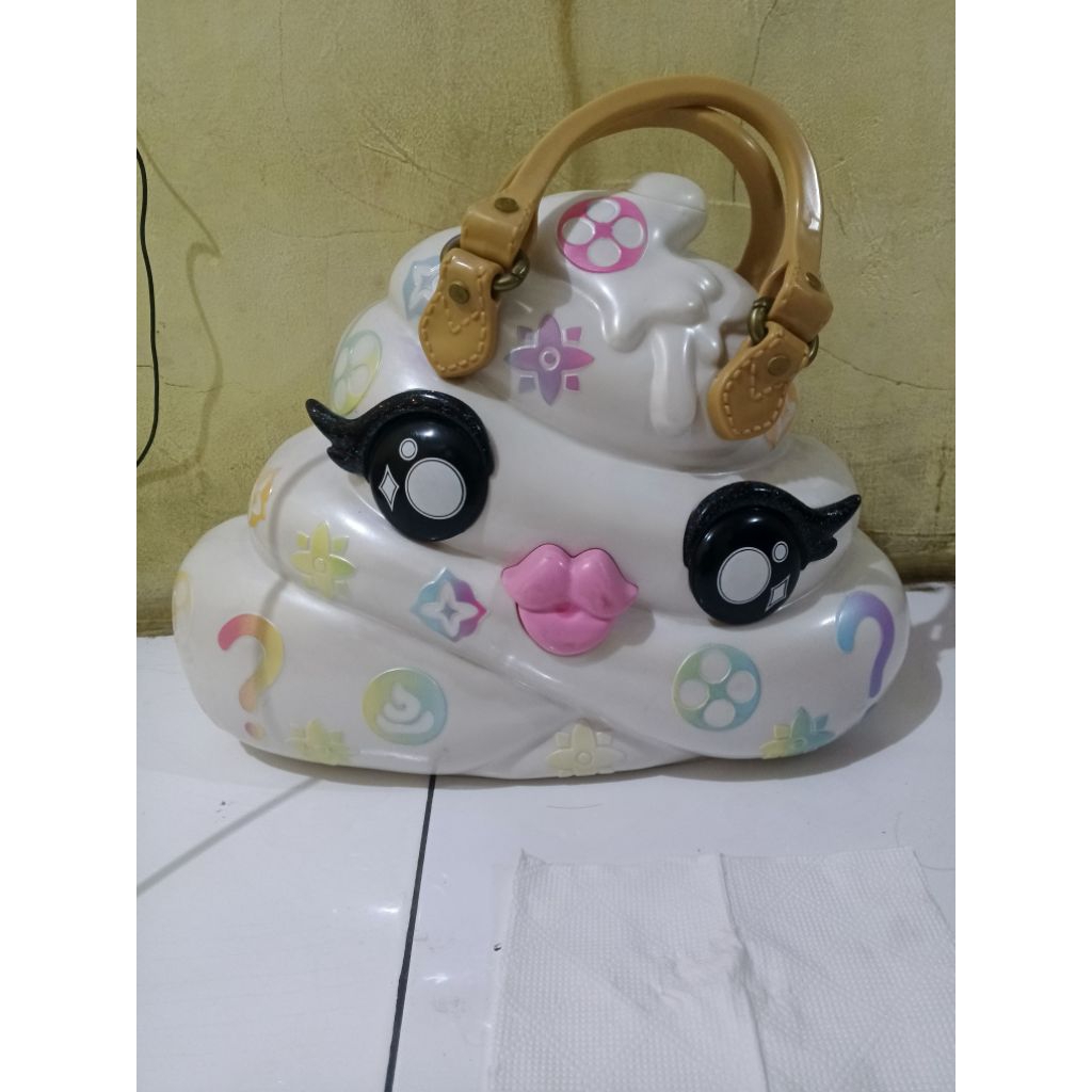 tas poopsie pooey puitton