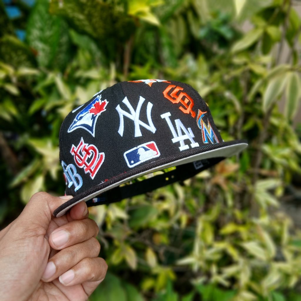 Topi New Era Teams All Over 9fifty Snapback