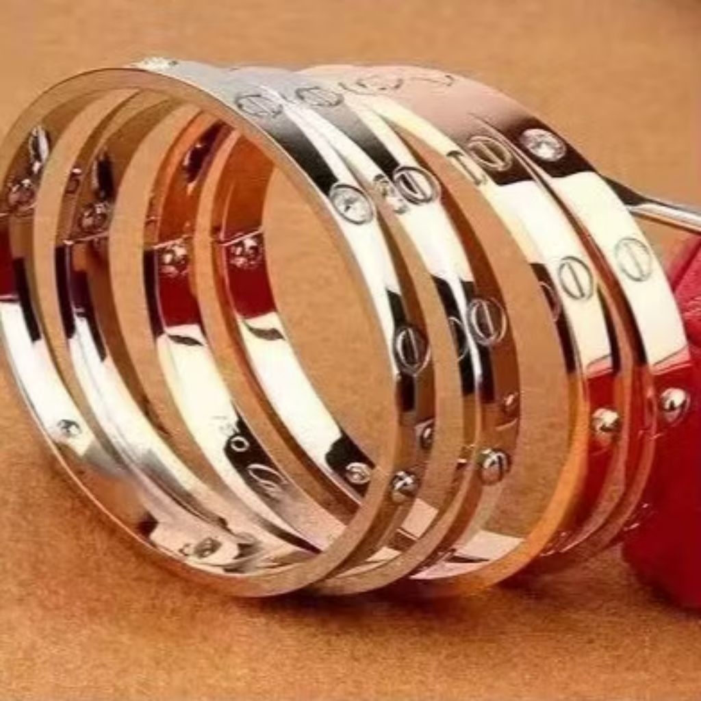Gelang titanium lapis emas