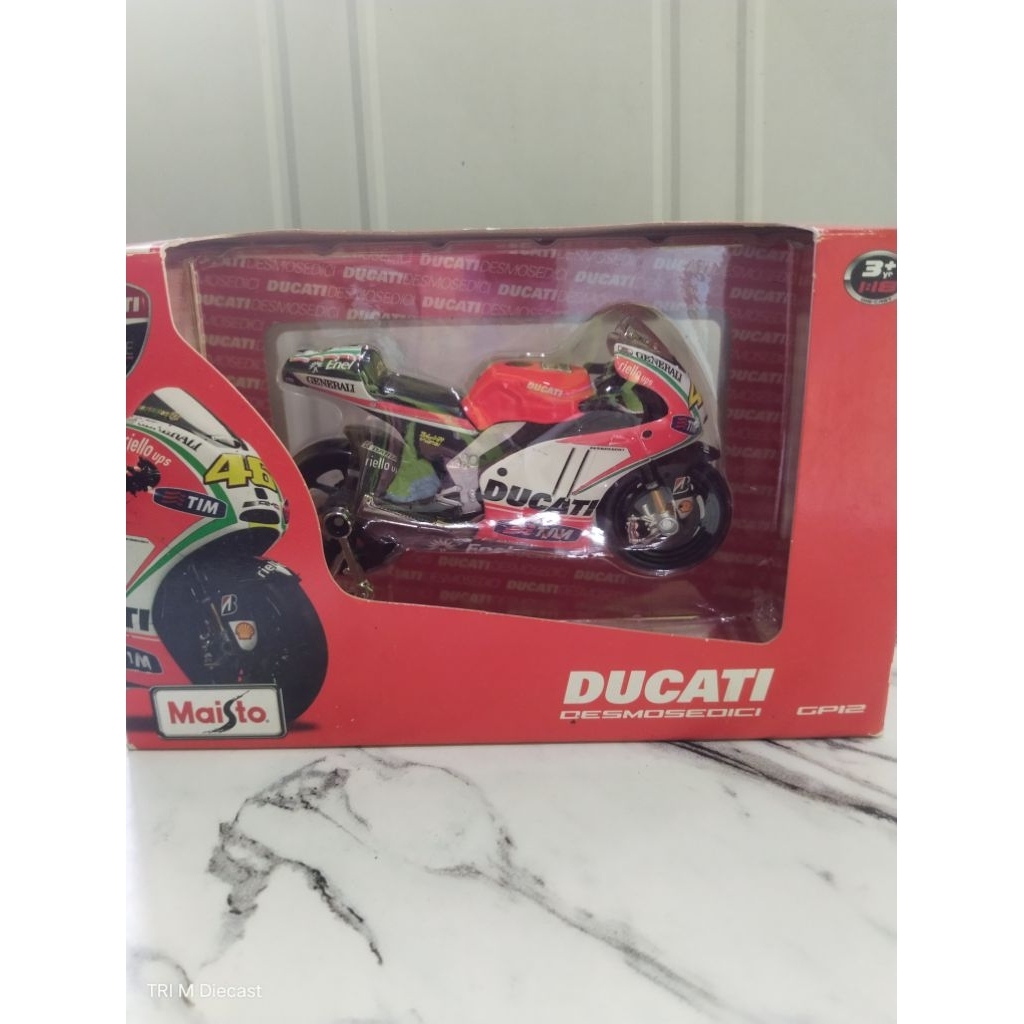 Miniatur diecast maisto ducati rossi 2012 skala 1:18