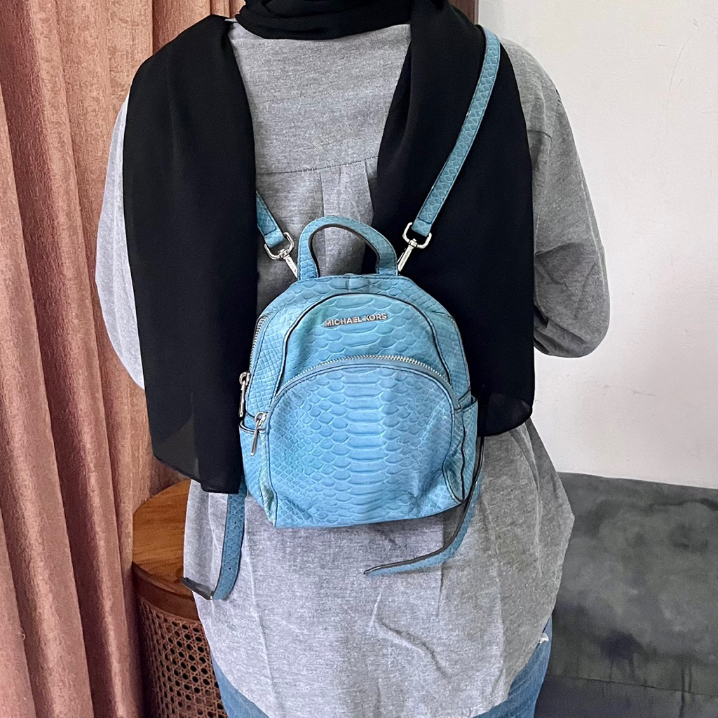 Michael kors mini backpack preloved