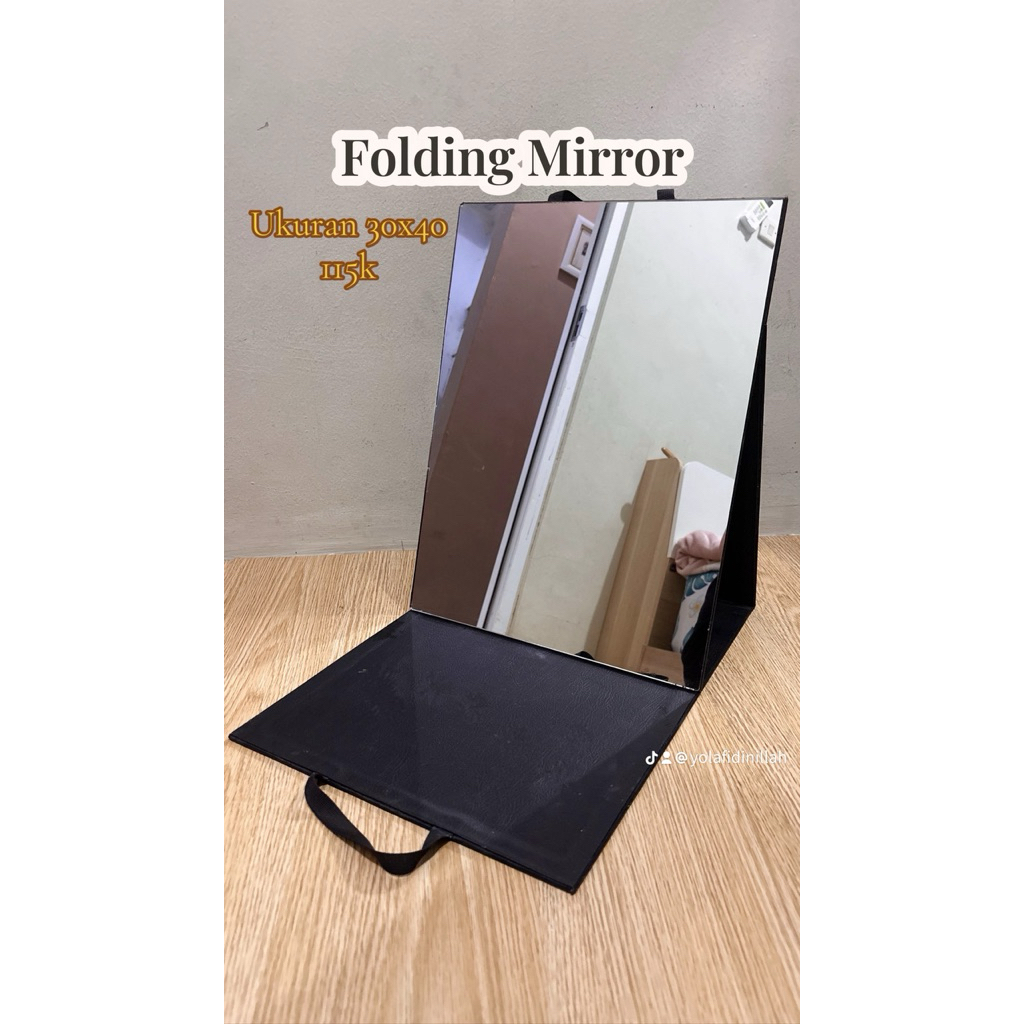 folding mirror