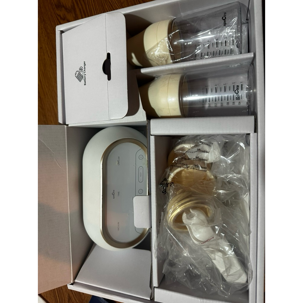 spectra dual compact breast pump ( preloved/second)