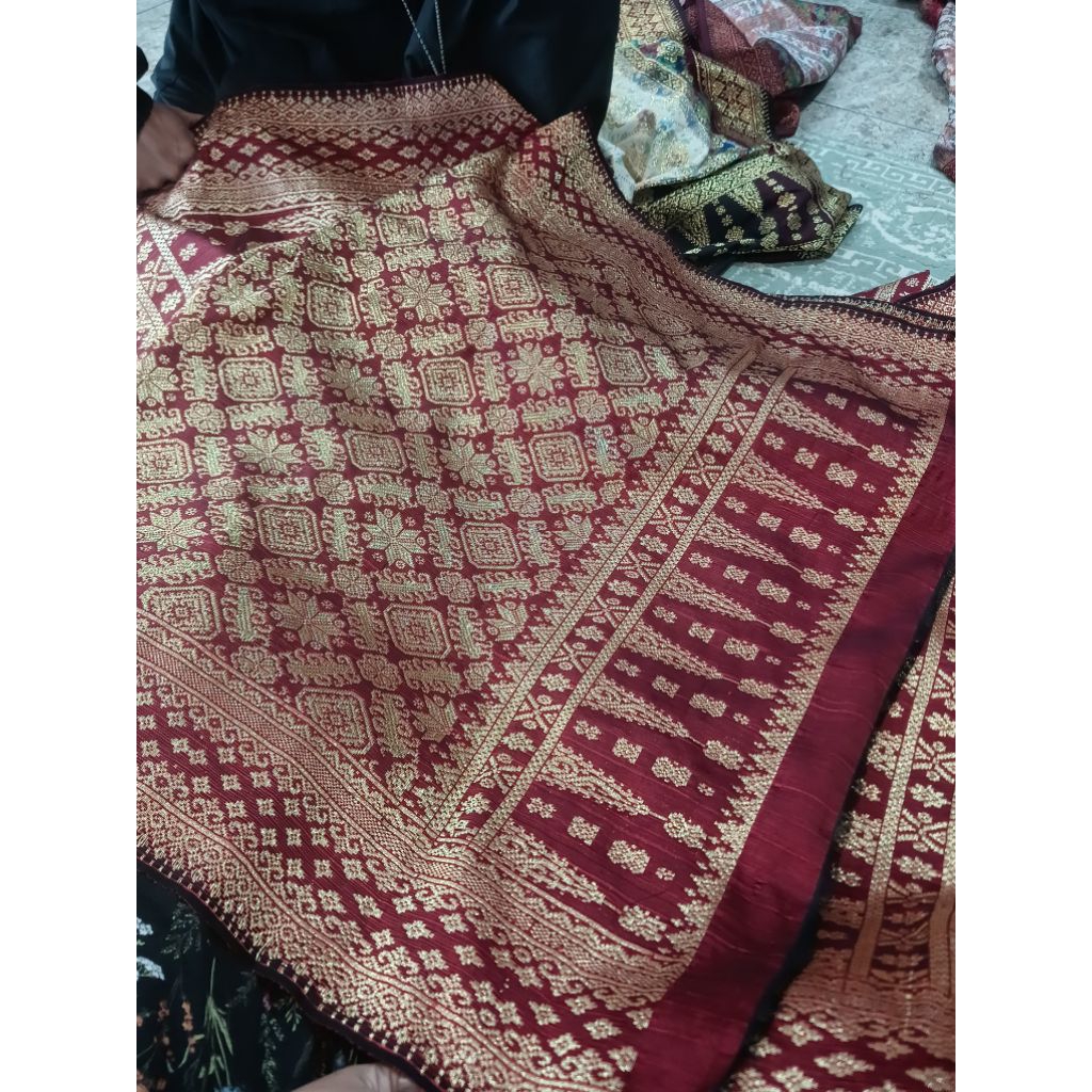 Songket tenun pengantin khas palembang