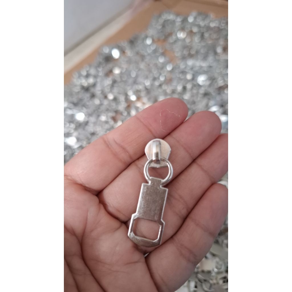 kepala resleting besi