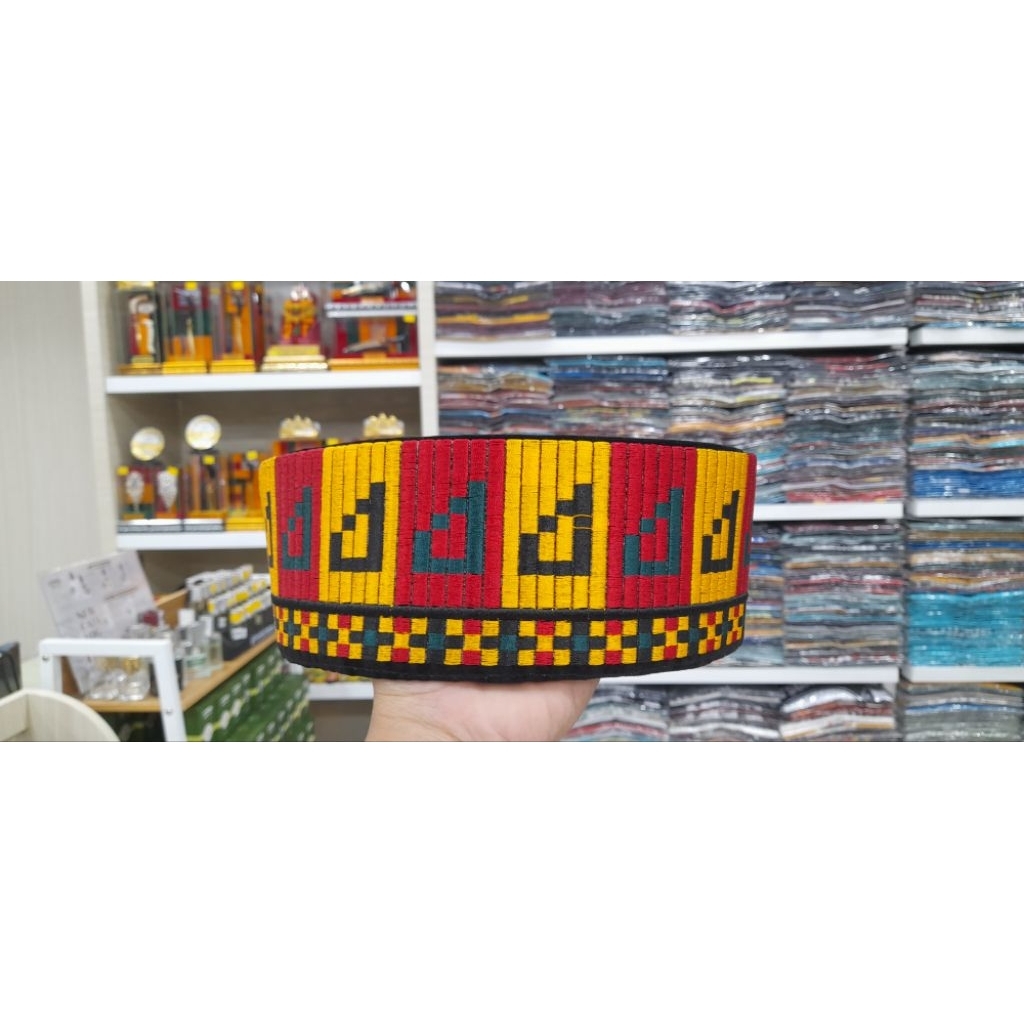 peci motif aceh
