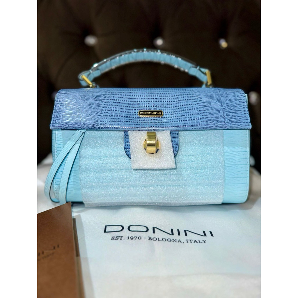 tas donini vigo blue likenew