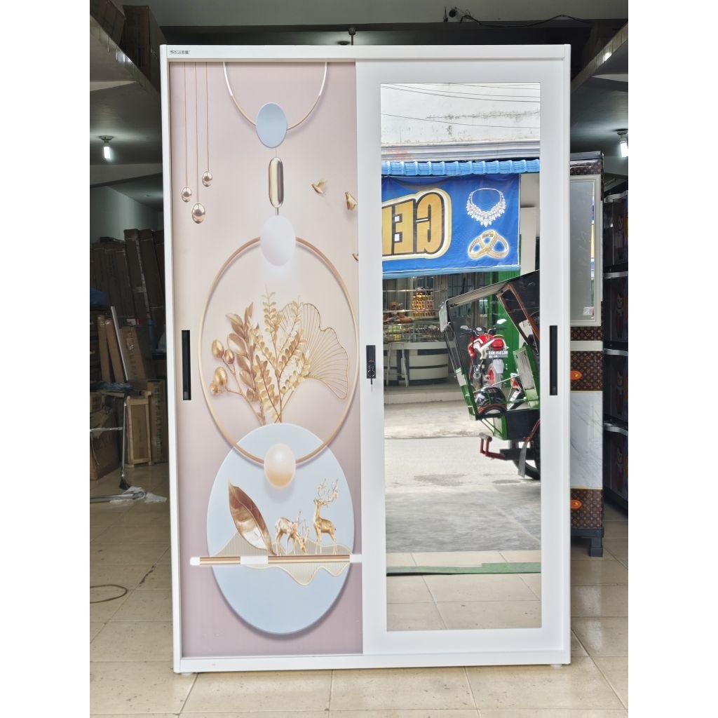 Lemari pakaian plat besi model sliding 2pintu