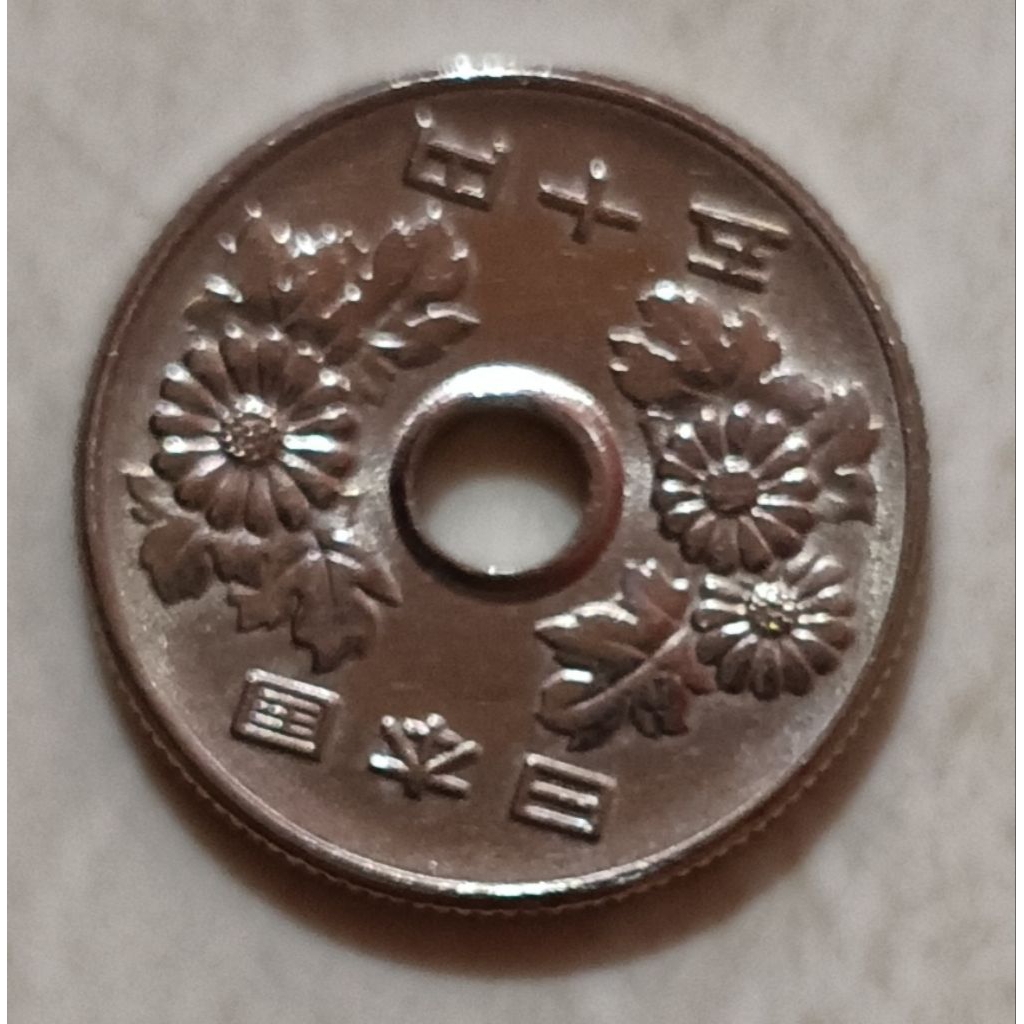 koin Jepang 50 yen tahun 1976..