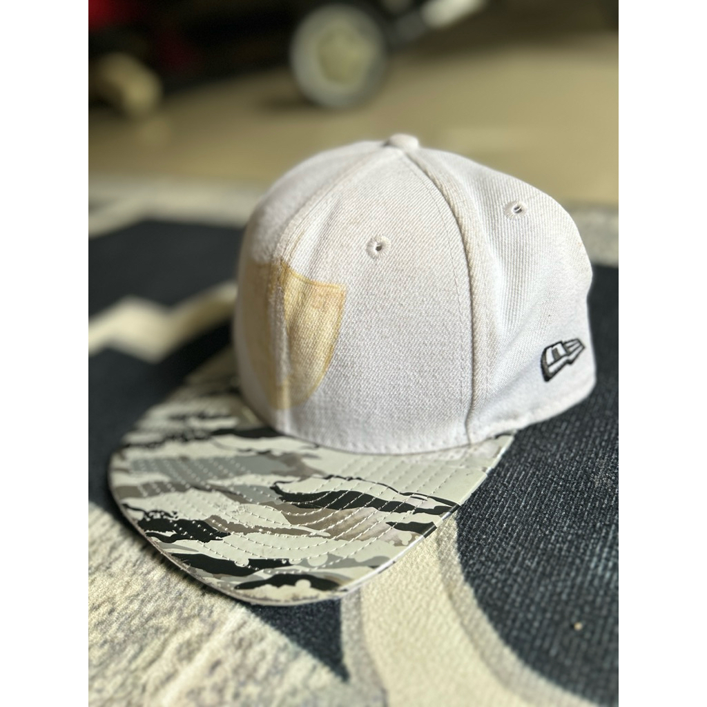Topi NFL Raiders New Era 9FIFTY Snapback White Camo – Minus Logo Depan